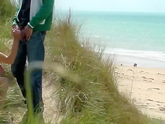 Couple play at the beach