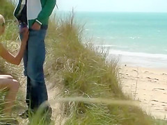 Couple play at the beach