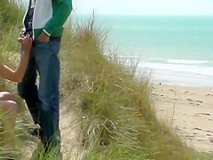 Couple play at the beach