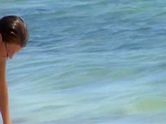 Nice brunette tits on the beach