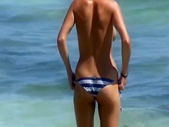 Nice brunette tits on the beach