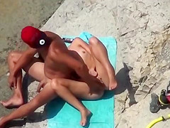 Beach couple sex play