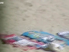 Playing football on the beach