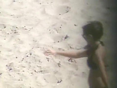 Playing football on the beach