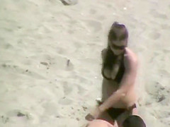 Playing football on the beach