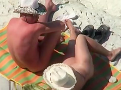 Mature nudist couple caught fucking at the beach