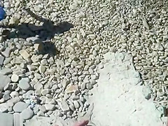 Mature nudist couple caught fucking at the beach