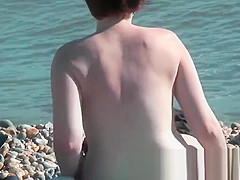 Beautiful nudist babes on beach posing for me