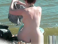 Sweatie tanned pussy at nudist beach