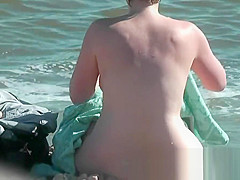 Sweatie tanned pussy at nudist beach