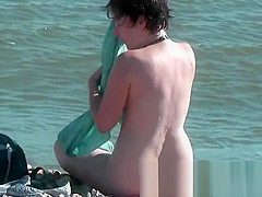 Sweatie tanned pussy at nudist beach