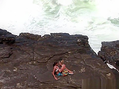 Two naughty girls drive to a desolate spot on the beach