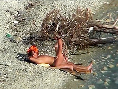 Couple fucking on a public beach, while walking past people