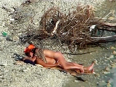 Couple fucking on a public beach, while walking past people