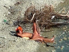 Couple fucking on a public beach, while walking past people