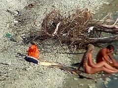 Couple fucking on a public beach, while walking past people