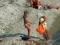Couple fucking on a public beach, while walking past people