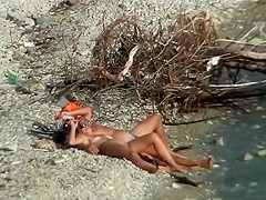 Couple fucking on a public beach, while walking past people