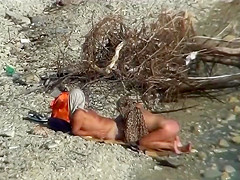 Couple fucking on a public beach, while walking past people