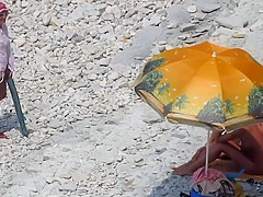 Voyeur. Blowjobs on public beach