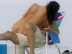 Couple split by Strangers on a nude beach