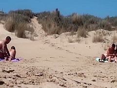 Sunbathing At Naked Beach With Two Couple Sex Voyeur