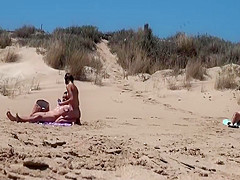 Sunbathing At Naked Beach With Two Couple Sex Voyeur
