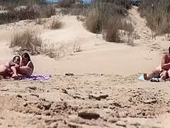 Sunbathing At Naked Beach With Two Couple Sex Voyeur