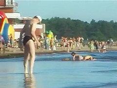 Spy nude girl picked up by voyeur cam at nude beach