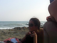 Several sexy nude girls caught on a beach with a spy cam