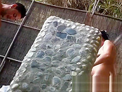 Several sexy nude girls caught on a beach with a spy cam
