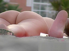 Sexy nudist young chicks sunbathing on a nude beach