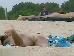 Voyeur beach shots of amateur people sunbathing nude
