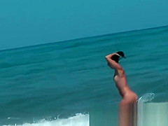 Sexy beach nudist girls get their hot booties admired