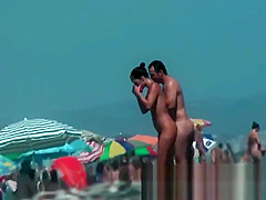 Sexy beach nudist girls get their hot booties admired
