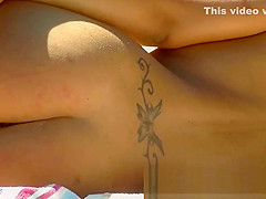 Slender cutie poses for a nudist beach voyeur