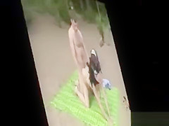 Voyeur teen fucking on the beach