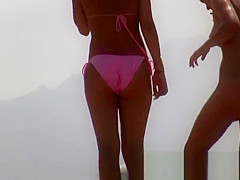 Sexy nudist chicks are being filmed on the beach