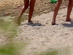 Nudist Milfs Sexy and Horny Tanning Nude At The Beach Voyeur