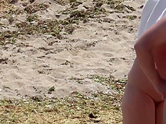 Nudist Milfs Sexy and Horny Tanning Nude At The Beach Voyeur