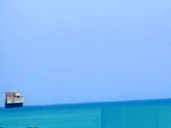 Sexy beach nudist women putting on lotion caught by spy cam