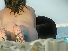 Sexy beach nudist girls get their hot booties admired