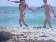 Amateur Nudist Beach Couple Walking Along The Beach