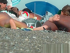 Sexy nudist babes filmed playing on the nude beach