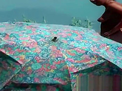 Sexy toned body walking naked on a crowded beach