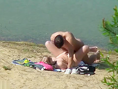 Nudist fuck filmed by beach spy