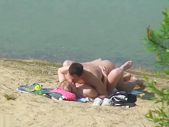 Nudist fuck filmed by beach spy