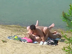 Nudist fuck filmed by beach spy