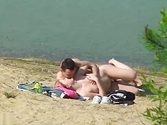Nudist fuck filmed by beach spy
