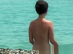 Real beach nudist voyeur pussies stretching on the sand